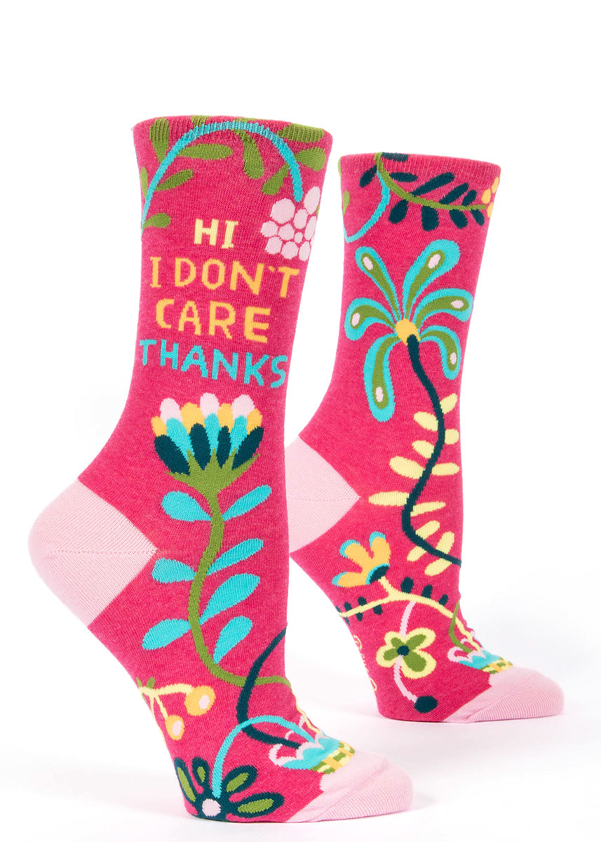 Funny women's socks that say “HI I DON'T CARE THANKS” with a pink floral design.