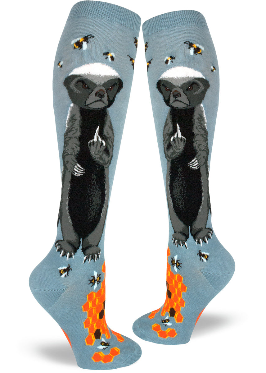 Funny knee-high honey badger socks for women with badgers flipping the middle finger and bees with honeycombs