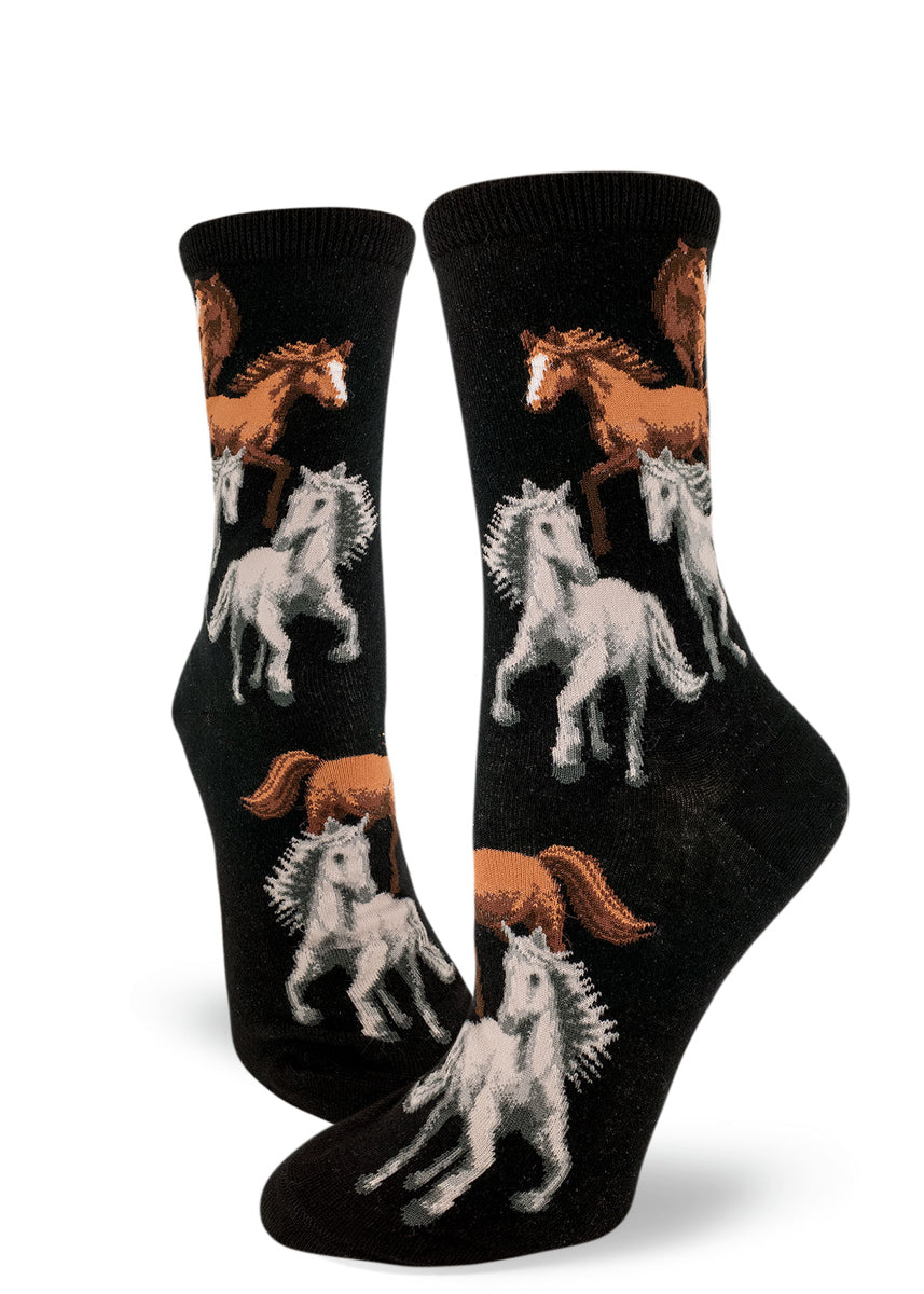 Horse socks for women with wild stallions running free on a black background