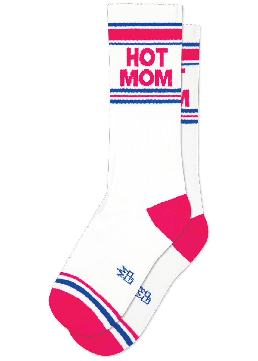 White retro gym socks with fuchsia and blue stripes and the phrase “HOT MOM" on the leg. 