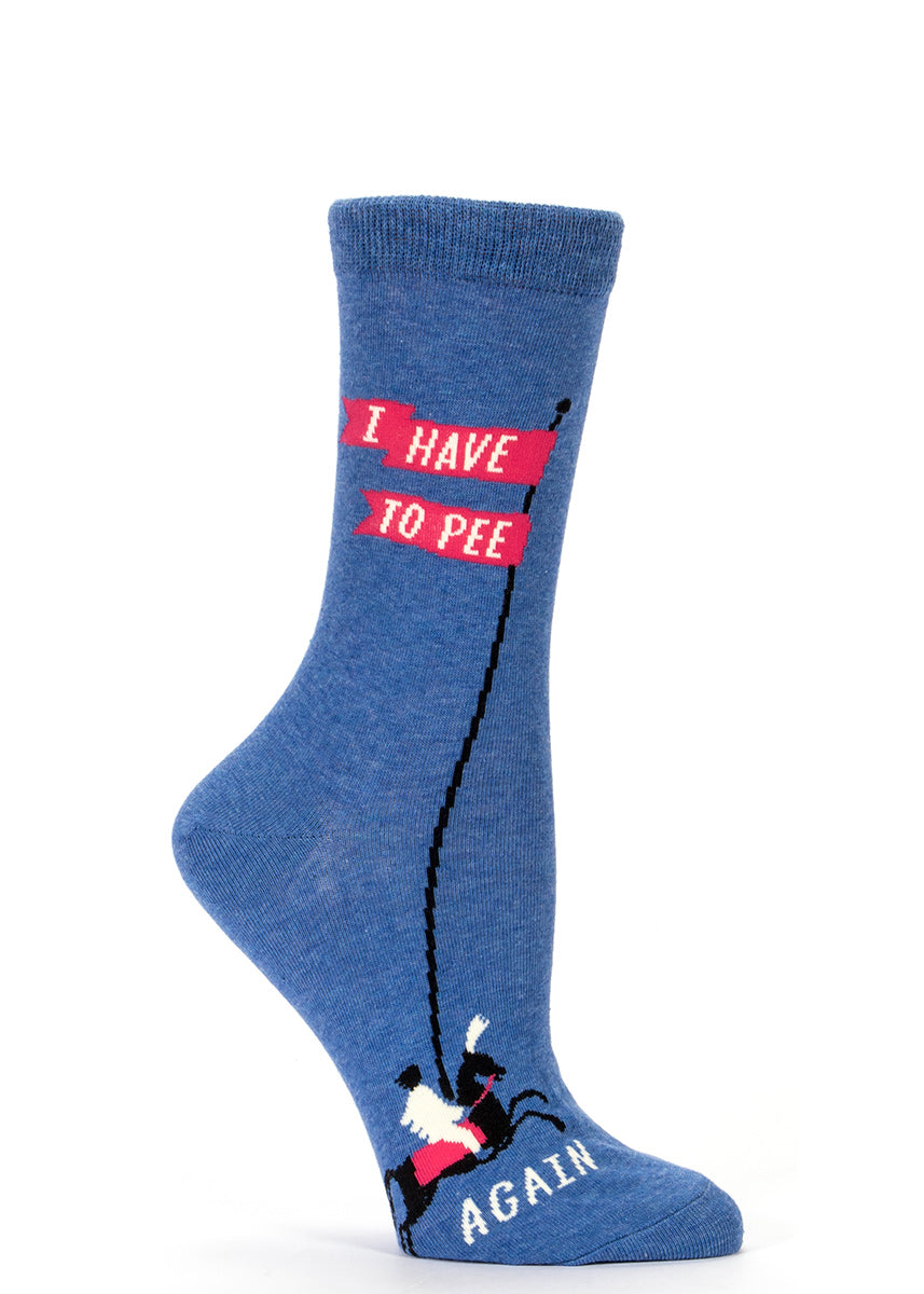 Funny women's socks that say "I have to pee again" with a blue background. 