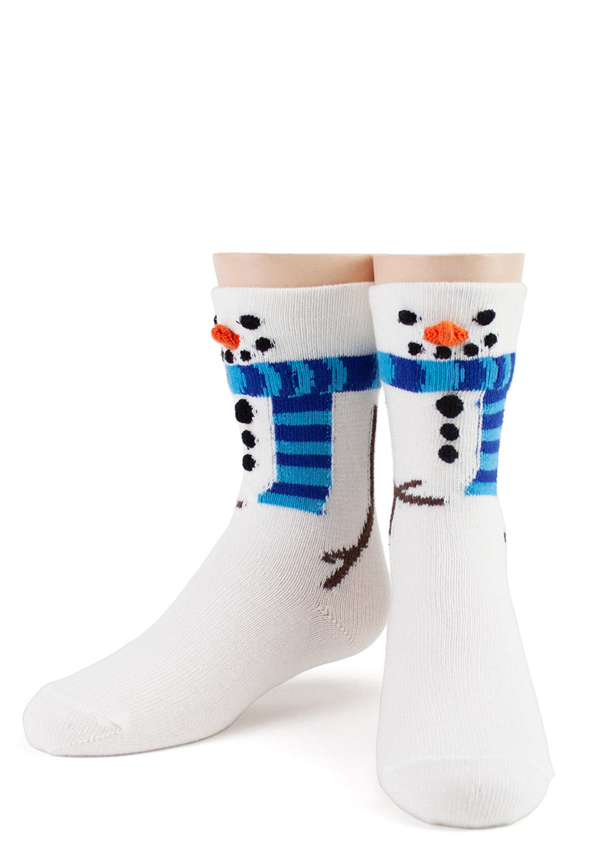 White crew socks with a 3D knitted carrot nose, coal buttons, mouth and eyes to make kids' feet look like snowmen.