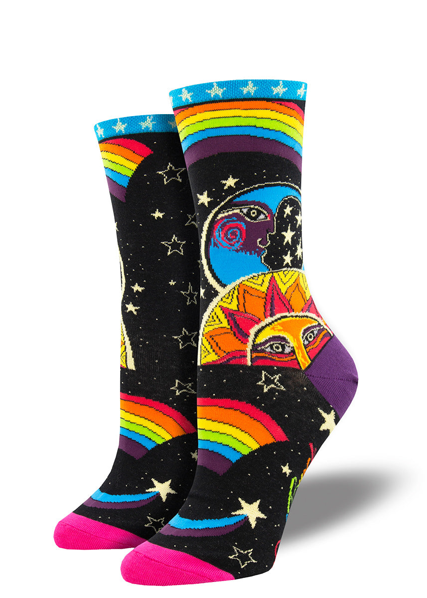 Laurel Burch socks for women feature a colorful cosmic moon and sun, glittering gold stars, and rainbows!