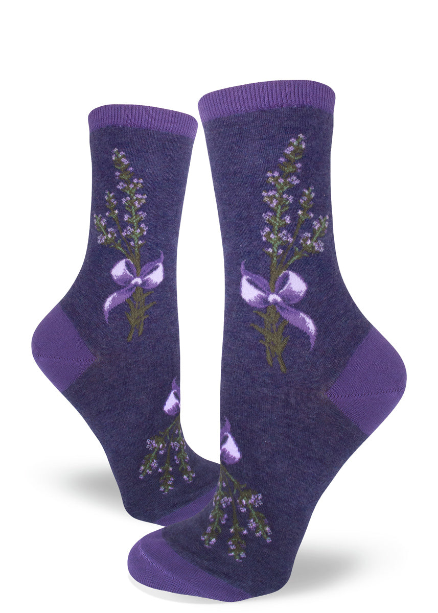 Lavender socks for women with lavender flowers tied in a bunch with purple ribbon on a heather purple background