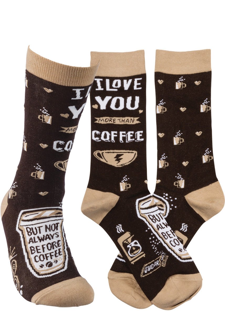 Funny coffee socks feature mugs full of coffee and little hearts, and the words, &quot;I love you more than coffee.&quot;