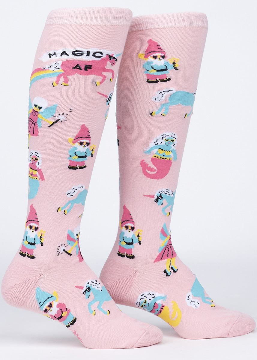 Fairytale knee socks for women feature gnomes, fairies, mermaids, and unicorns rocking sunglasses with the words, "MAGIC AF." 