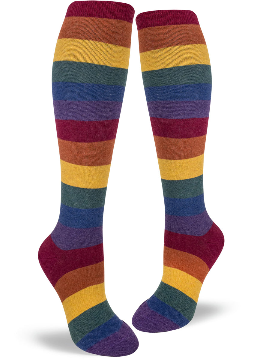 Knee-high rainbow socks with muted colored rainbow stripes