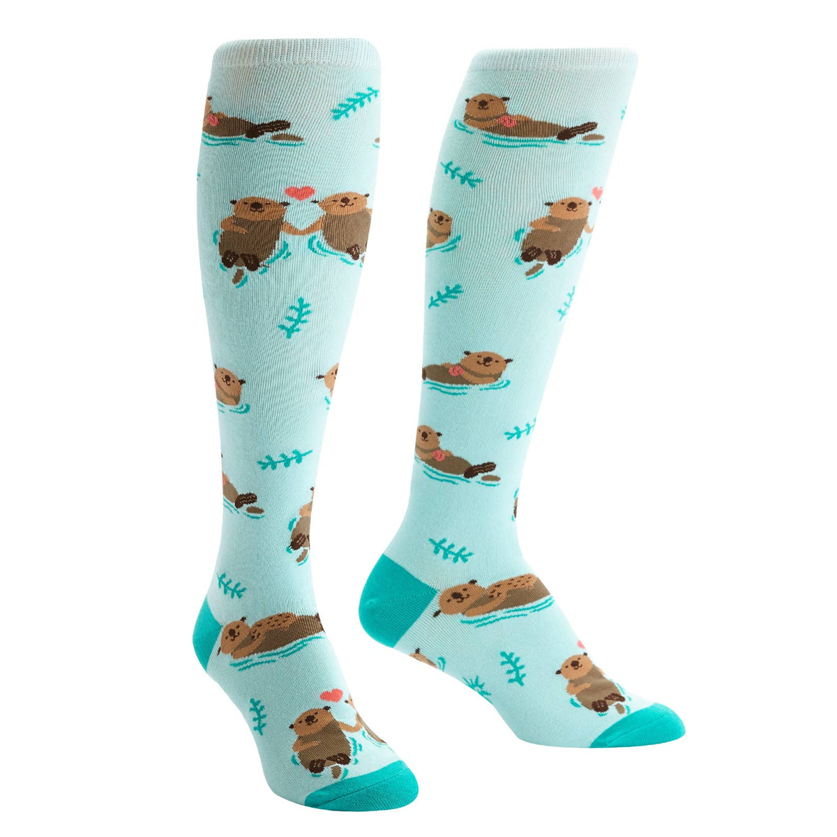 Smiling otters float about this knee high sock, holding hands and cuddling their young.