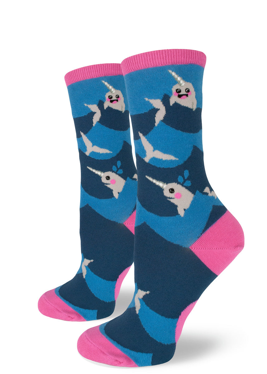 Cute narwhal socks for women with narwhals smiling and swimming between blue waves