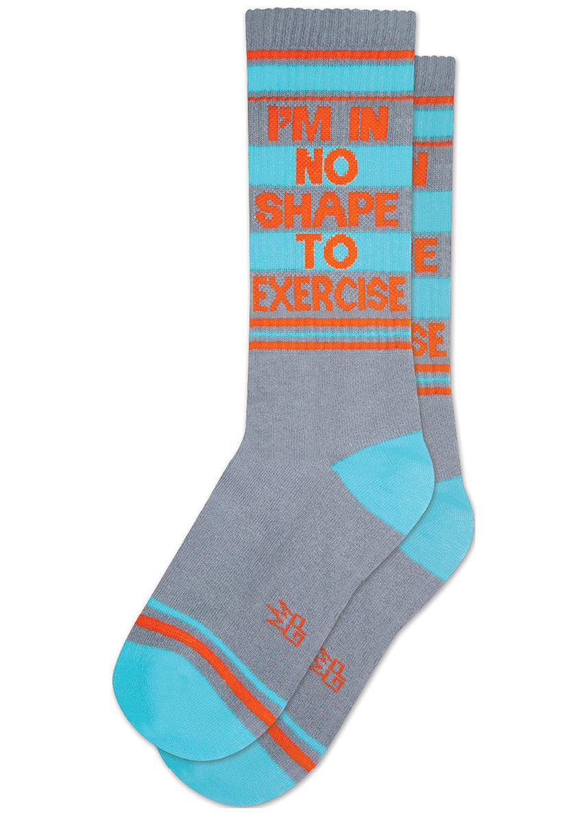 Funny retro striped gym socks with words on the leg saying "I'M IN NO SHAPE TO EXERCISE."