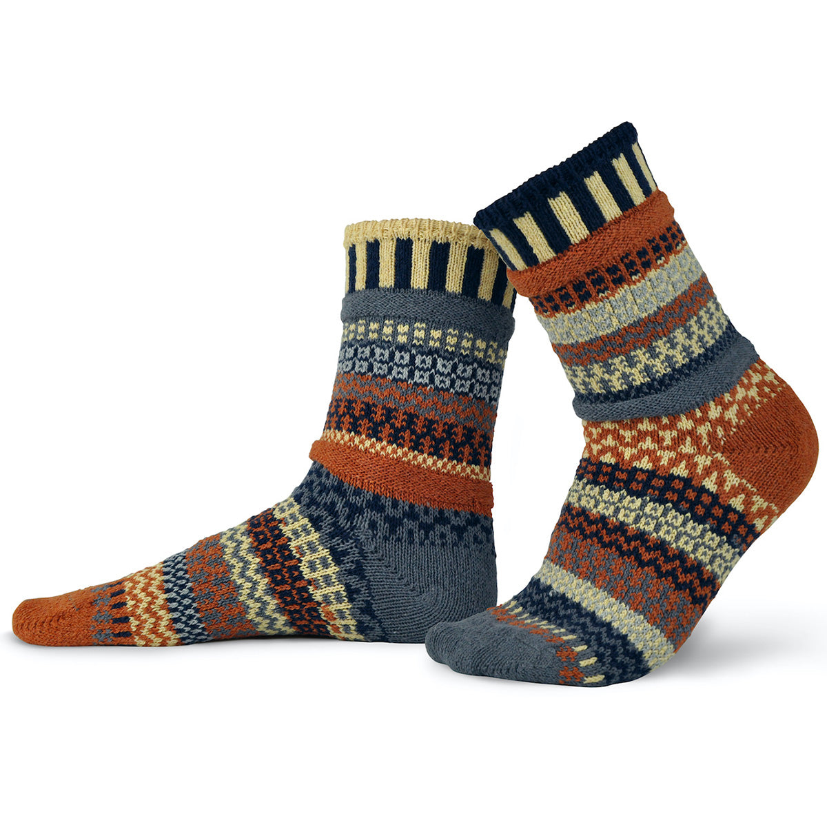 Nutmeg mismatched socks from Solmates feature patterned stripes in tones of gray, brown, light yellow, and black!