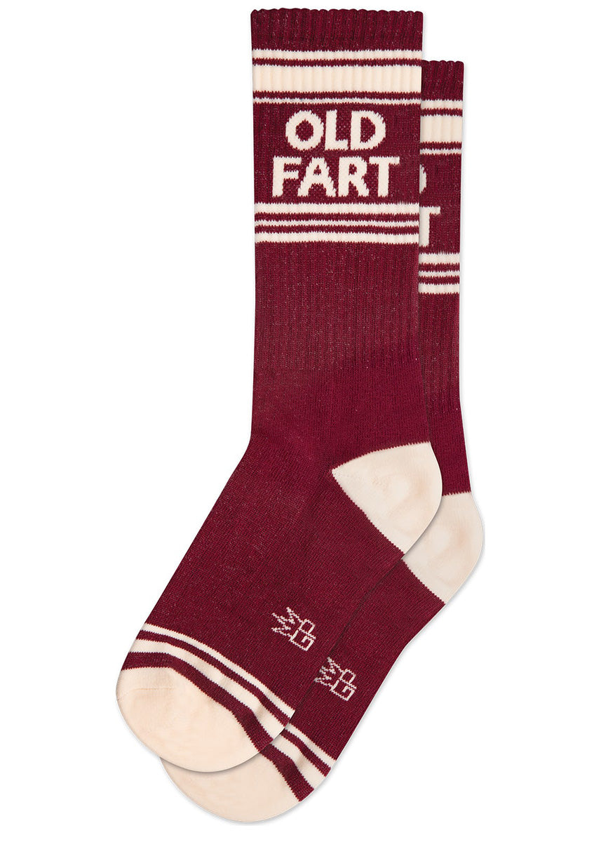 Funny Old Fart socks with athletic-style cream stripes on a burgundy background