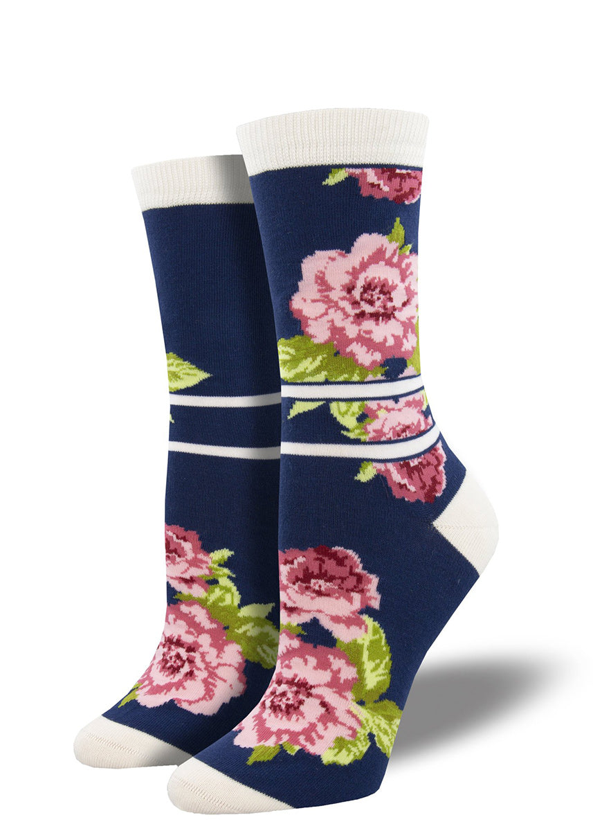 Bamboo crew socks for women feature pink peonies on a navy background with cream stripe accents.