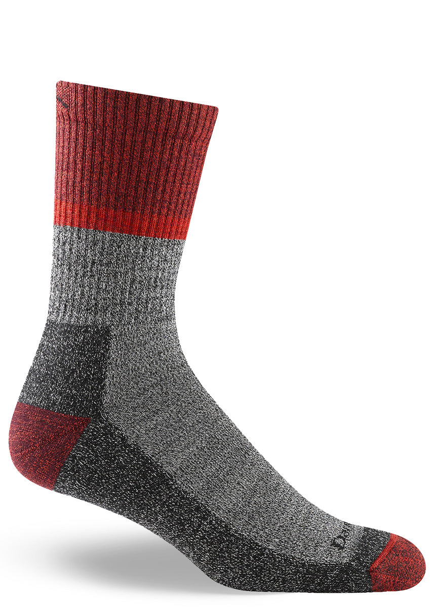 Gray flecked cushioned wool hiking socks for men with a wide red cuff and red accents at the heel and toe.