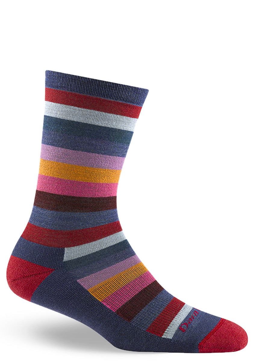 Cushioned wool socks for women feature funky stripes in blues, pinks, gold, red, and brown.
