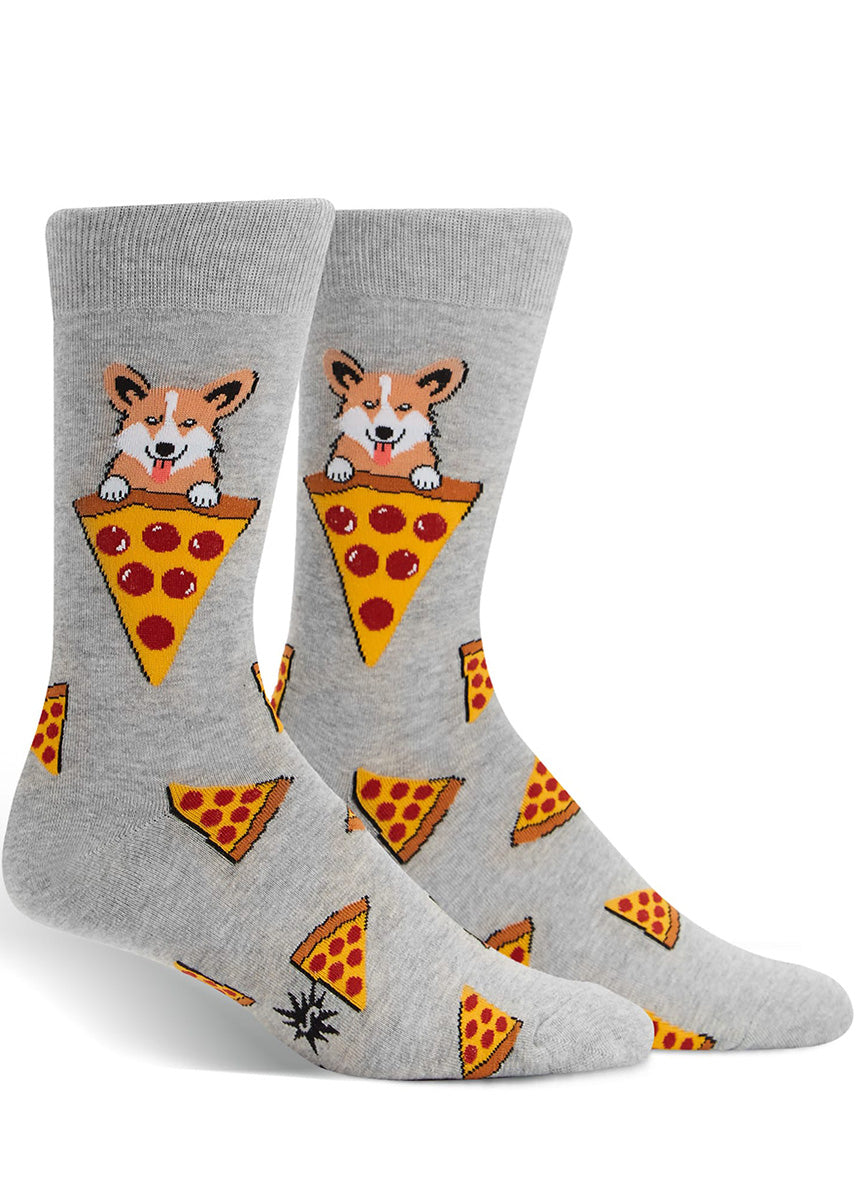 Funny men&#39;s socks with corgi dogs and pizza slices on a gray background