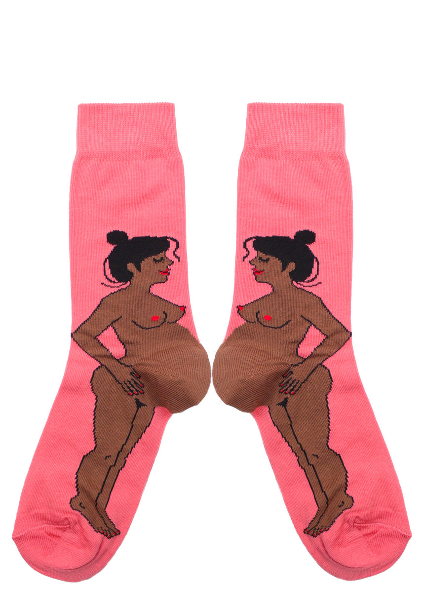 Funny pregnancy socks feature a pregnant Black mom-to-be with black hair, her round belly forming the heel of the socks.