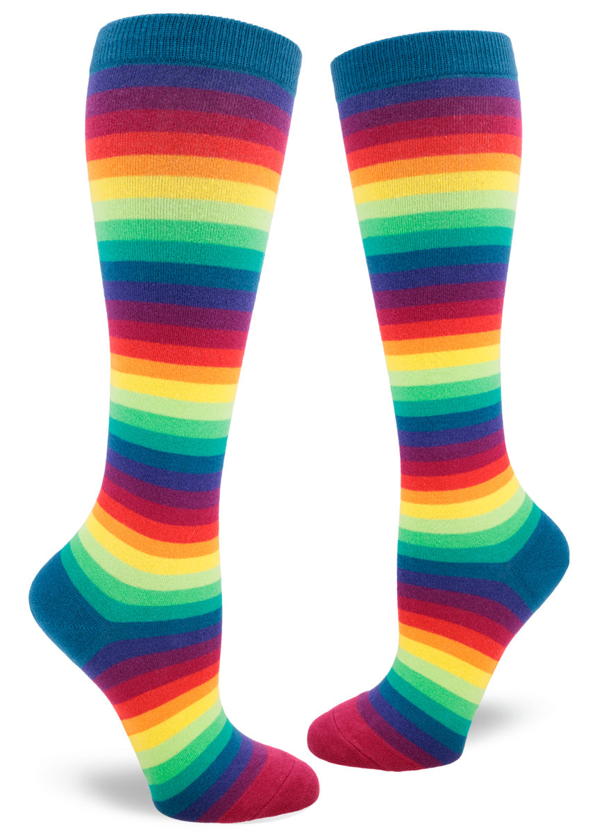 Colorful rainbow gradient knee socks with a repeating pattern of stripes in 10 colors that make up the full visible spectrum.