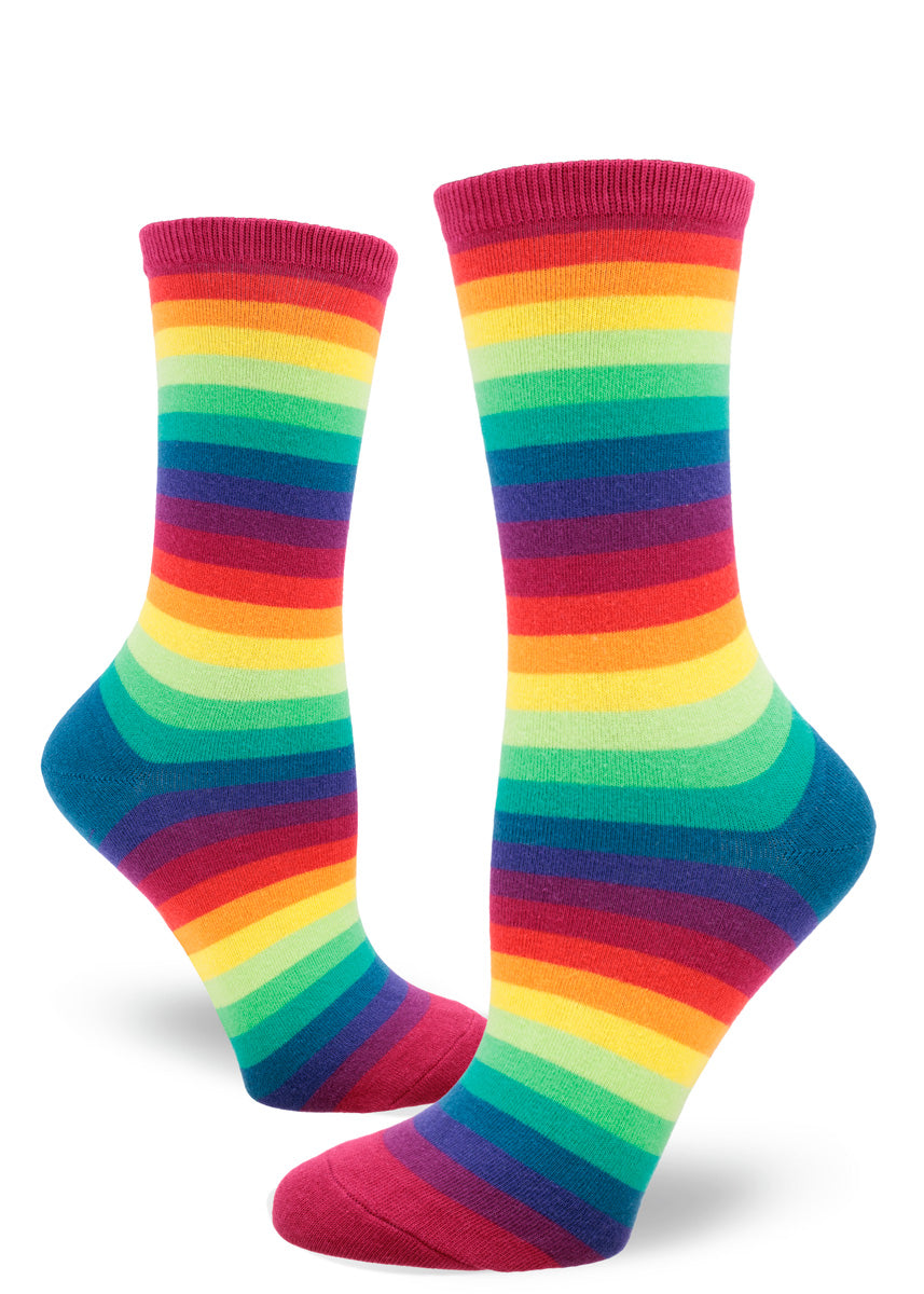 Colorful rainbow gradient women's crew socks with a repeating pattern of stripes in 10 colors that make up the full visible spectrum. 