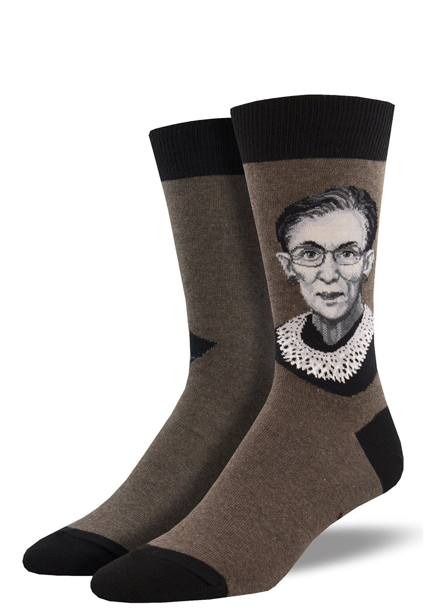 Crew socks for men feature a black and white portrait of Ruth Bader Ginsburg wearing one of her famous collars on a brown heather background.
