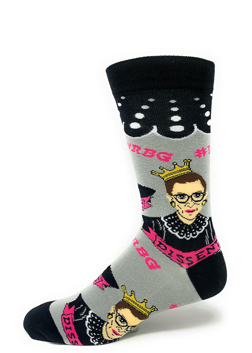Justice Ruth Bader Ginsburg wears a crown on these gray novelty socks that say "Dissent." and "#RBG."