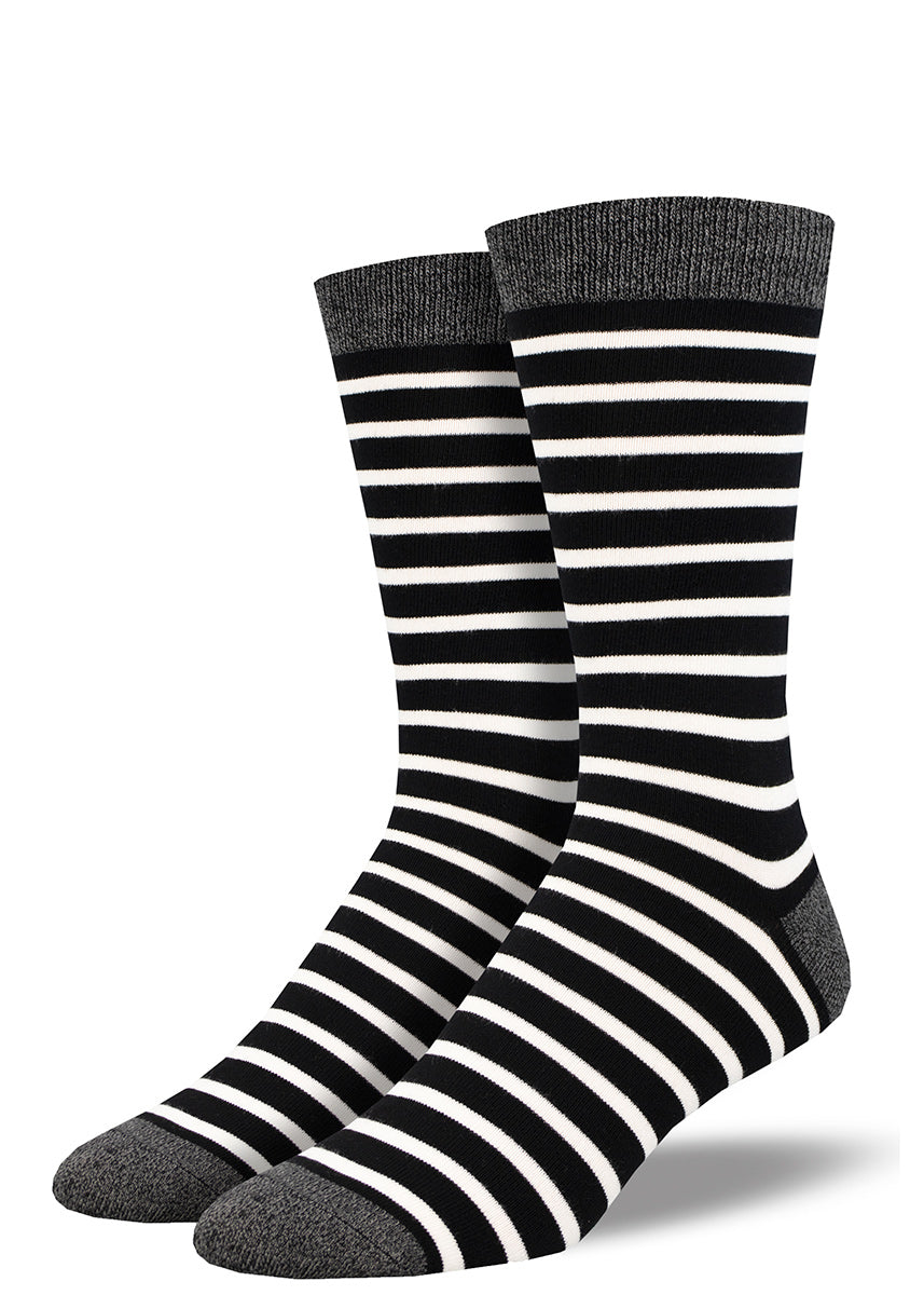 Bamboo socks for men feature black and white stripes with charcoal heather toes, cuffs and heels.