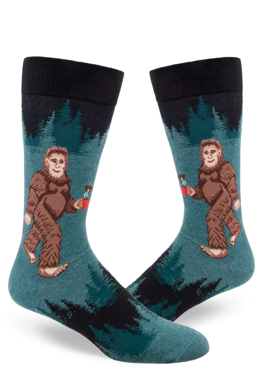 Funny crew socks for men show Sasquatch with a cup of coffee in the woods!