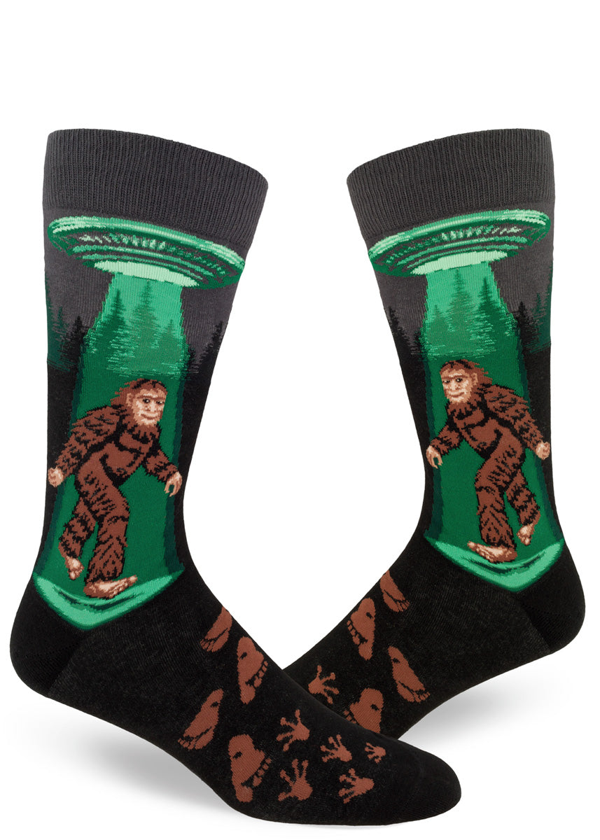 Sasquatch socks for men with Bigfoot and a flying saucer in the forest