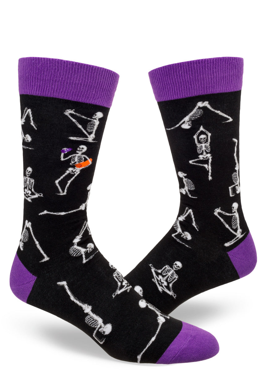 Funny Halloween socks for men show skeletons in different yoga poses.