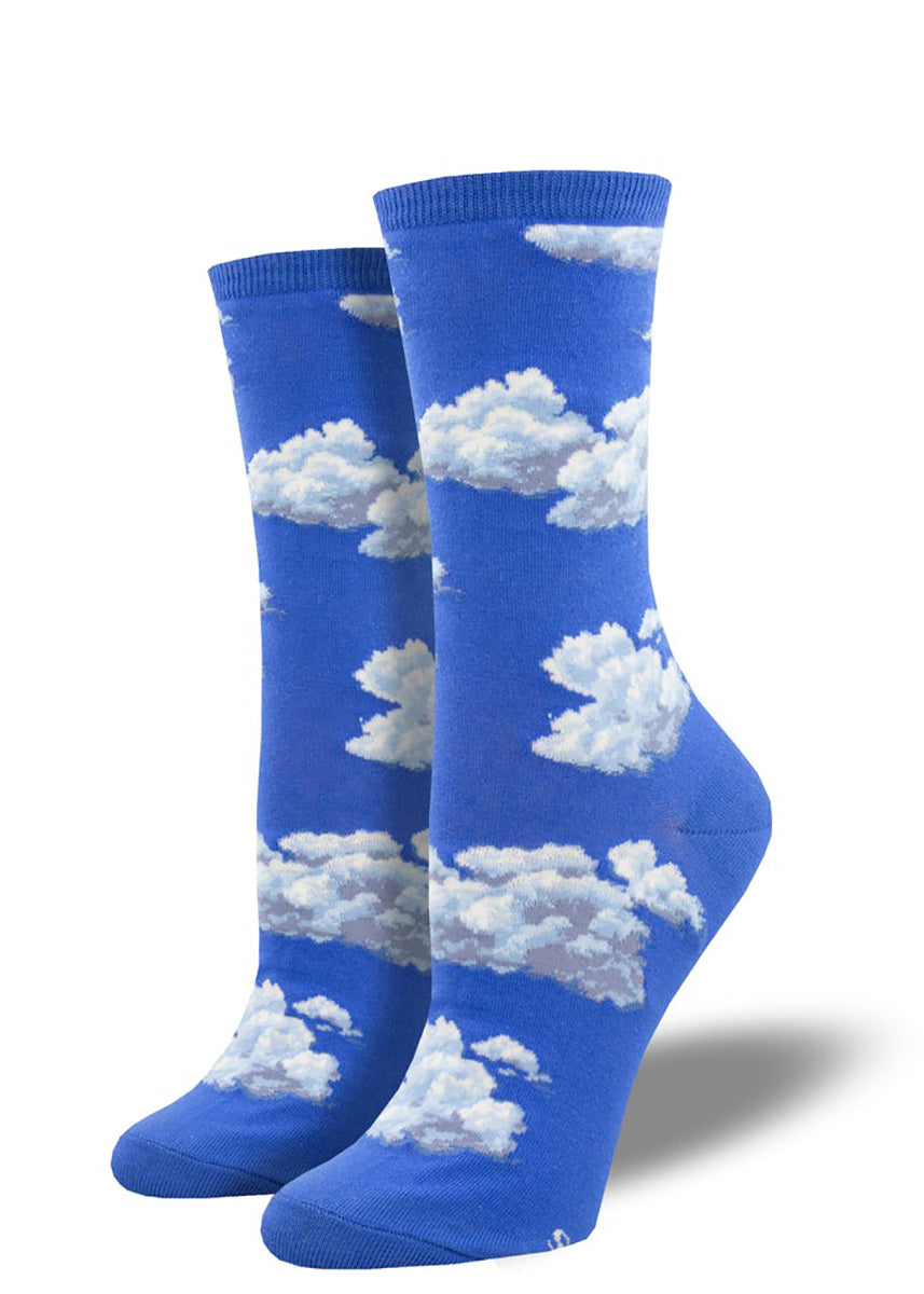 Blue socks covered in a pattern of fluffy clouds.