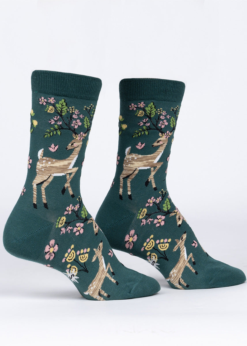 Spring socks for women show adorable deer with flowers and leaves bursting out of their antlers.