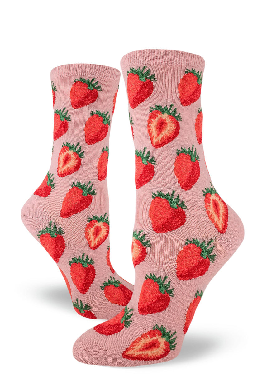 Strawberry socks for women with cute strawberries on a pink background