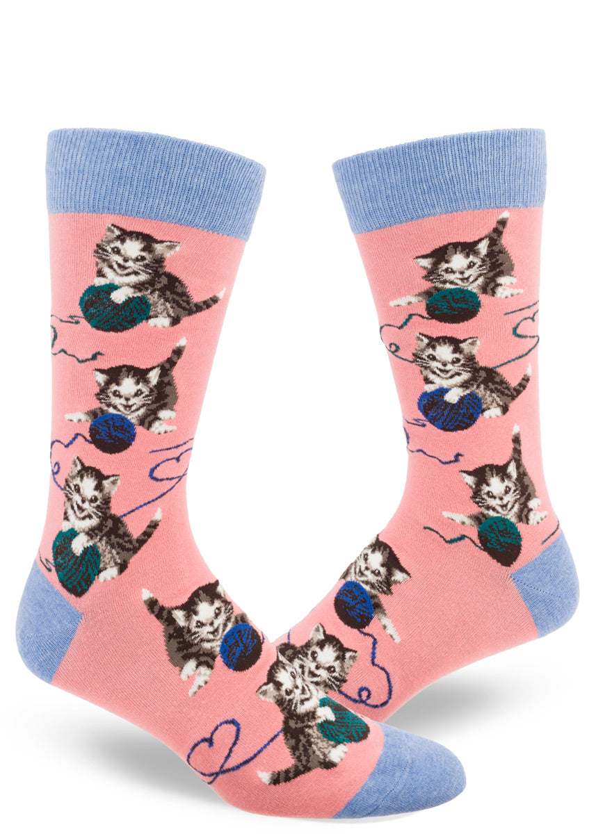 Cat socks for men show adorable kittens playing with blue and green balls of yarn!