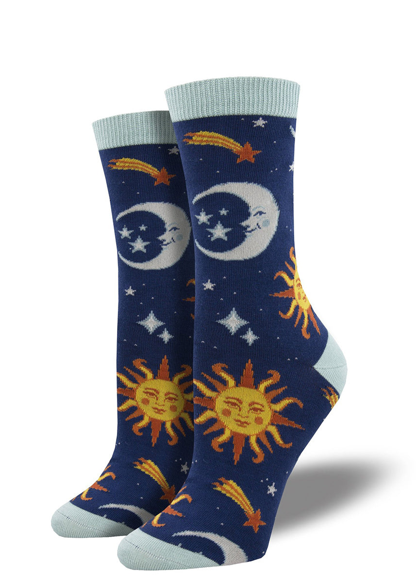 Bamboo crew socks for women feature suns and moons with faces surrounded by stars in the night sky.