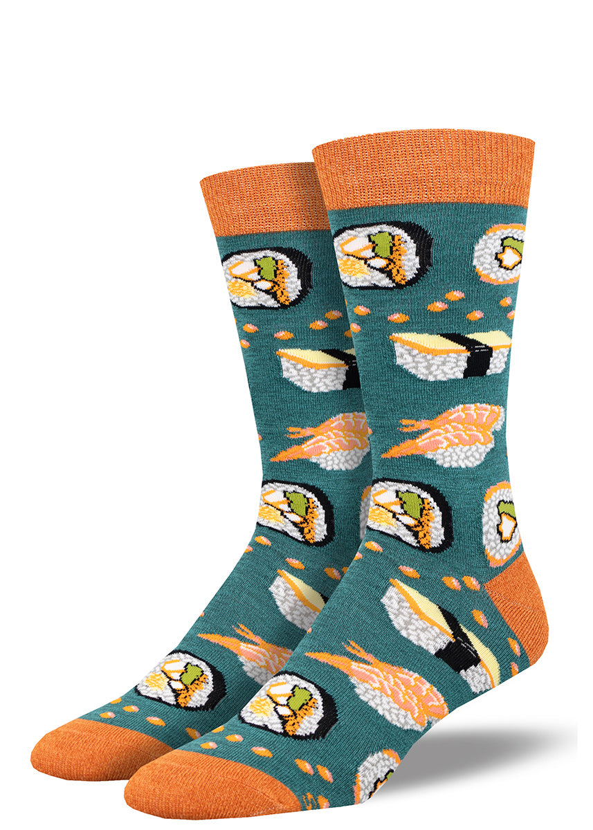 Men's Dress Socks with a novelty design depicting a variety of sushi  over a teal green background, accented in orange at the heel, toe and cuff.