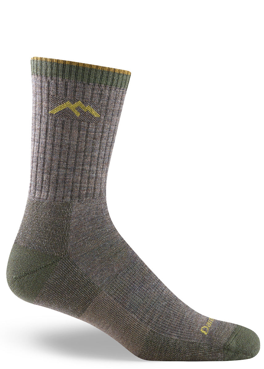 Darn Tough&#39;s classic micro crew cushioned merino wool hiking socks for men in taupe with green and gold accents.