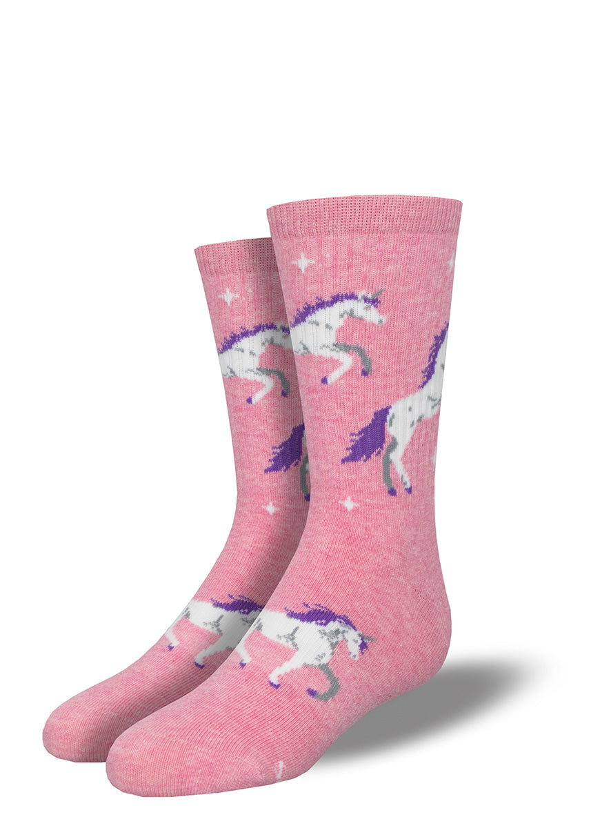 Cute pink athletic socks for kids covered in white unicorns with purple manes.