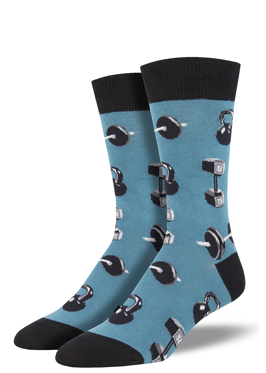 Blue novelty weightlifting-themed crew socks for men with a pattern of barbells and kettlebells.