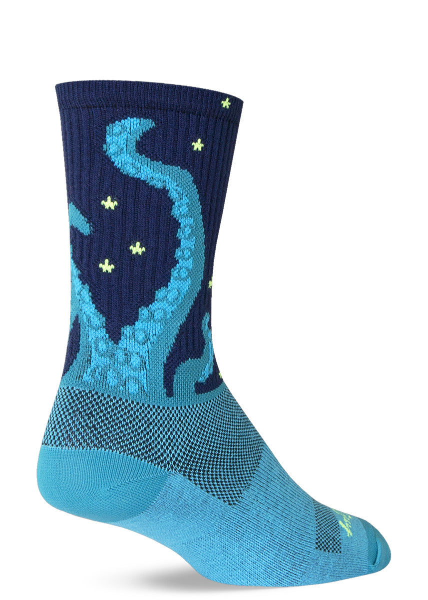 Kraken socks for men and women with octopus or squid tentacles rising from the ocean with stars in the night sky