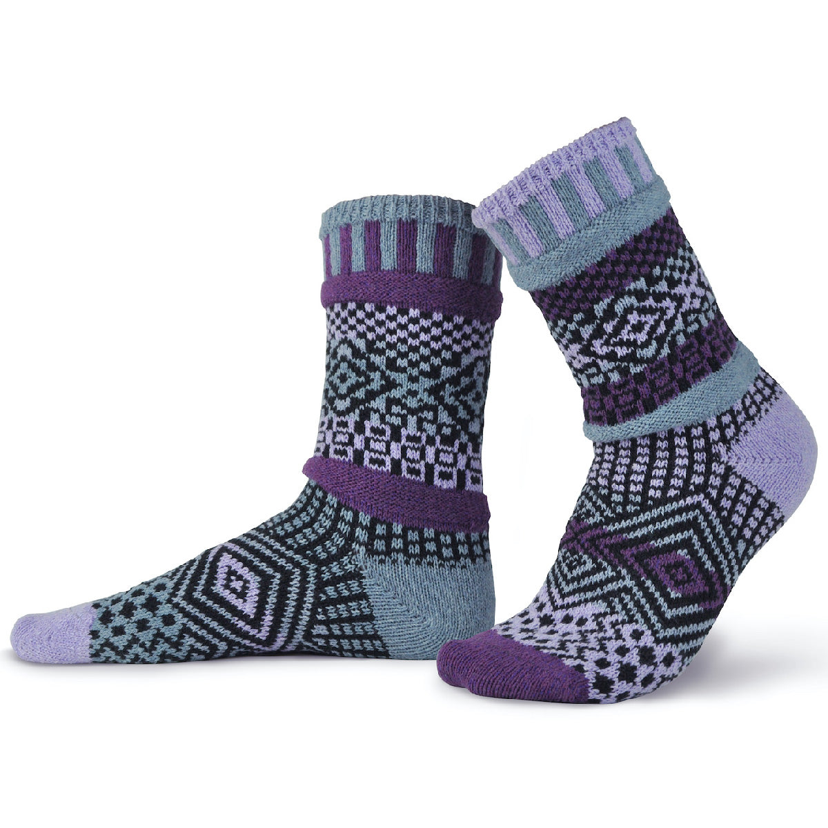 Funky patterned socks are intentionally mismatched and feature shades of dark purple, light purple, cool gray, and black!