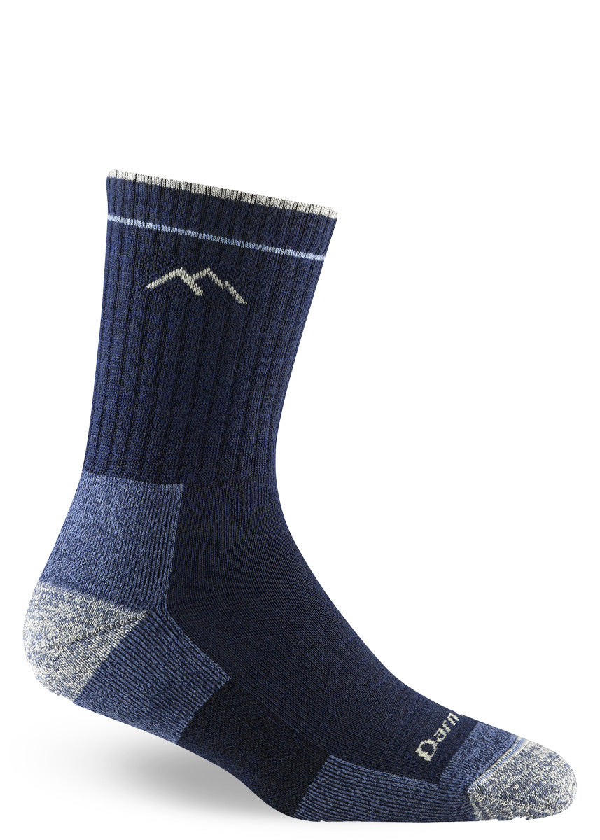 Deep navy blue cushioned crew hiking socks made from merino wool.