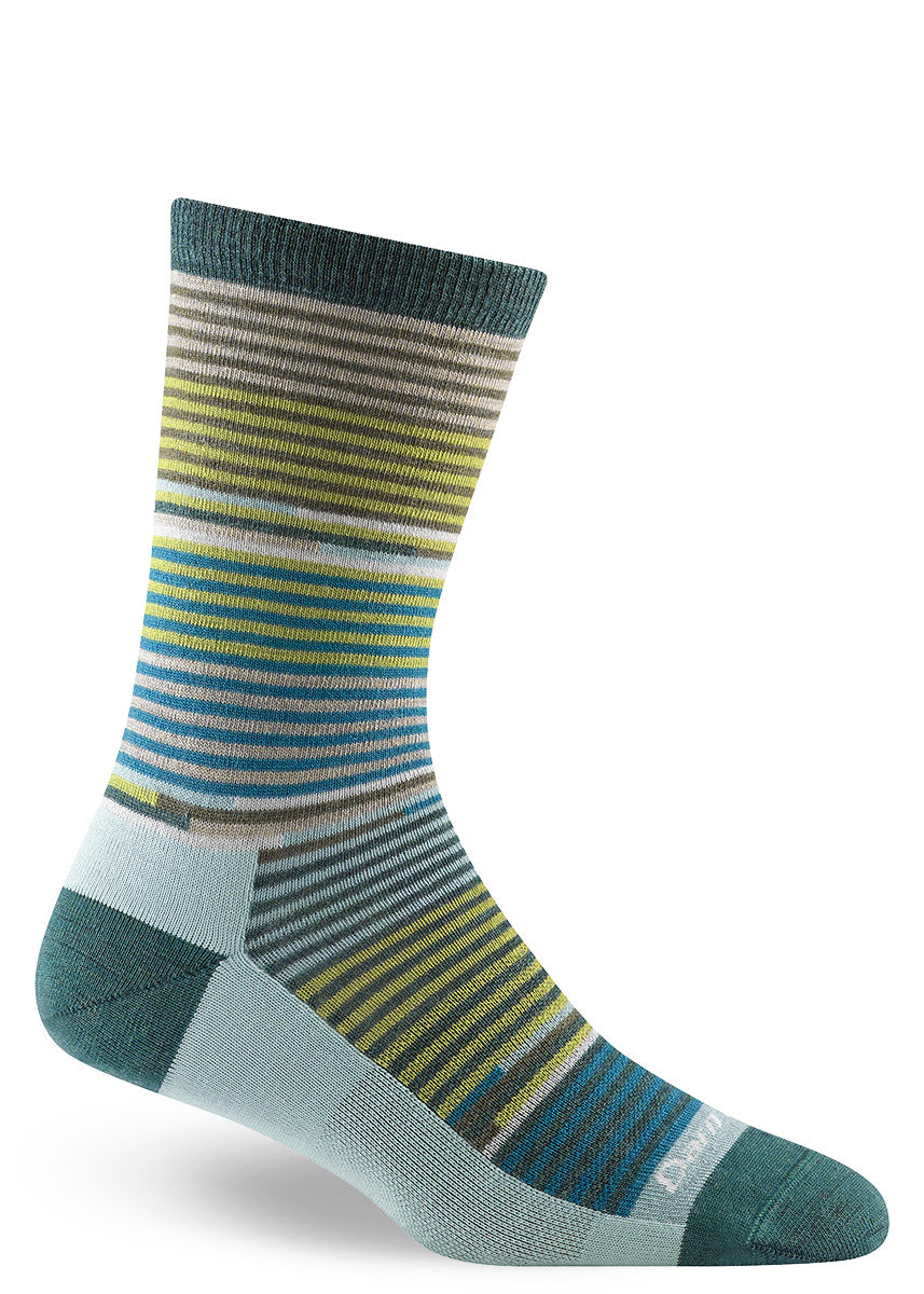 Merino wool crew socks with an allover pattern of thin stripes in watery shades of teal and green plus taupe.