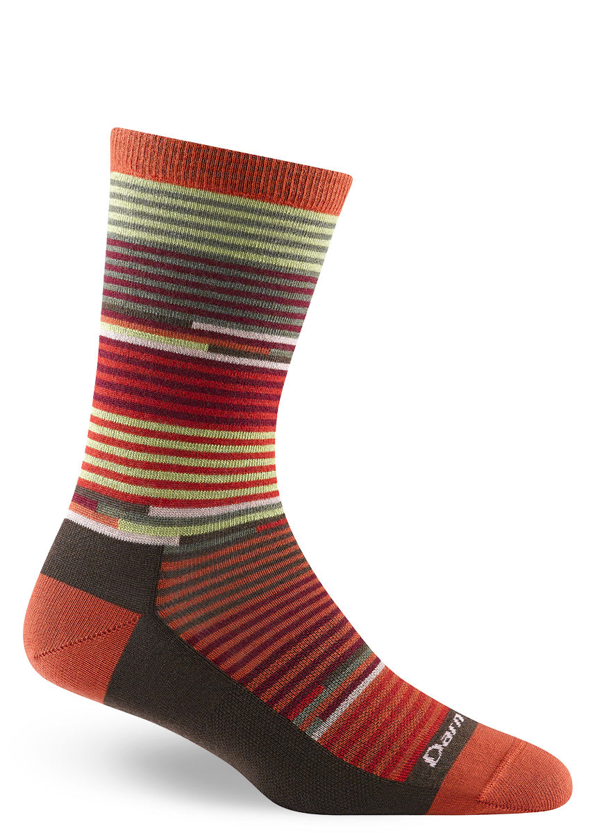 Merino wool crew socks in a pattern of thin stripes in complementary colors including tomato red, burgundy, green and lime.